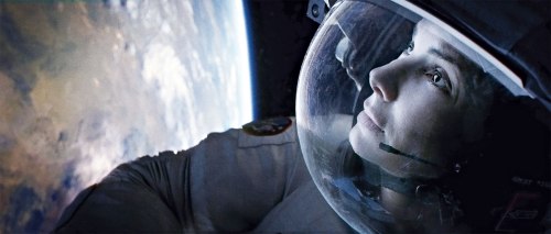 Behind the visor: Gravity also effectively induced panicked audience involvement by shooting from Stone's point of view